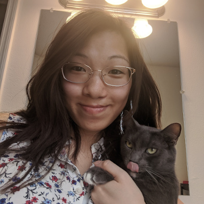 Photo of me with my cat, Gray.